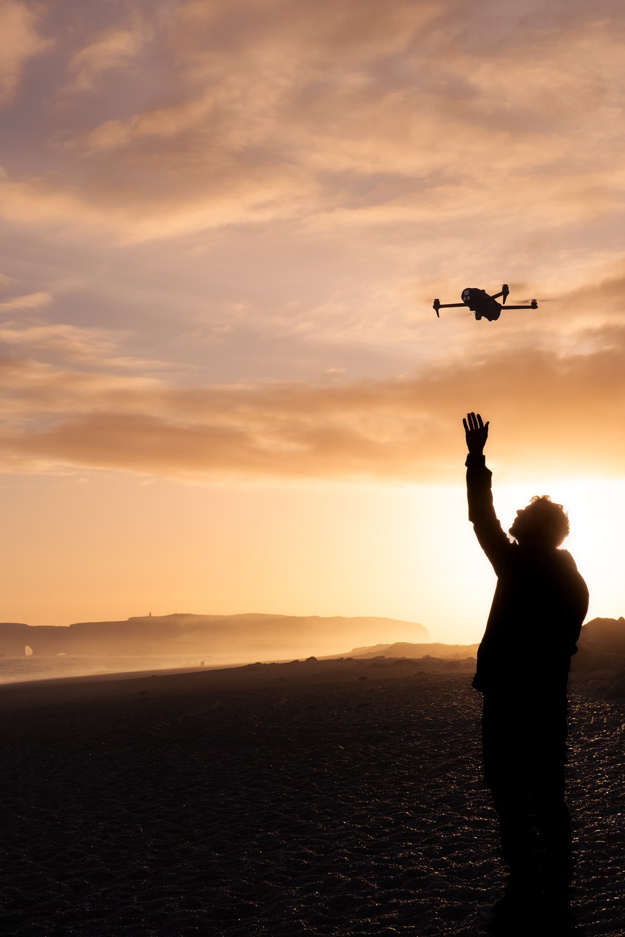 Photographer holding a camera at golden hour — MPB Everfind