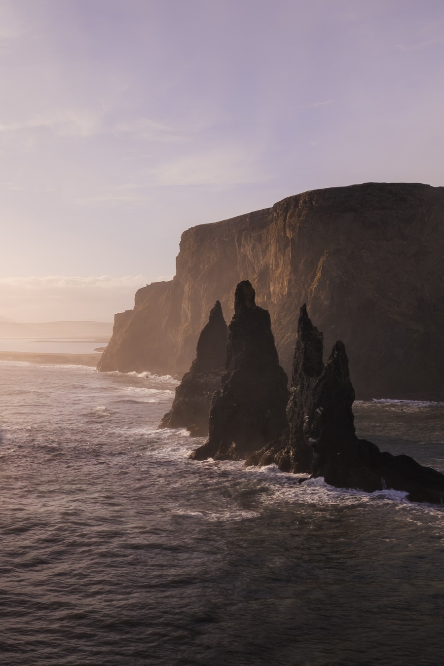 Basalt sea stacks along the Icelandic coast at sunset — MPB Everfind